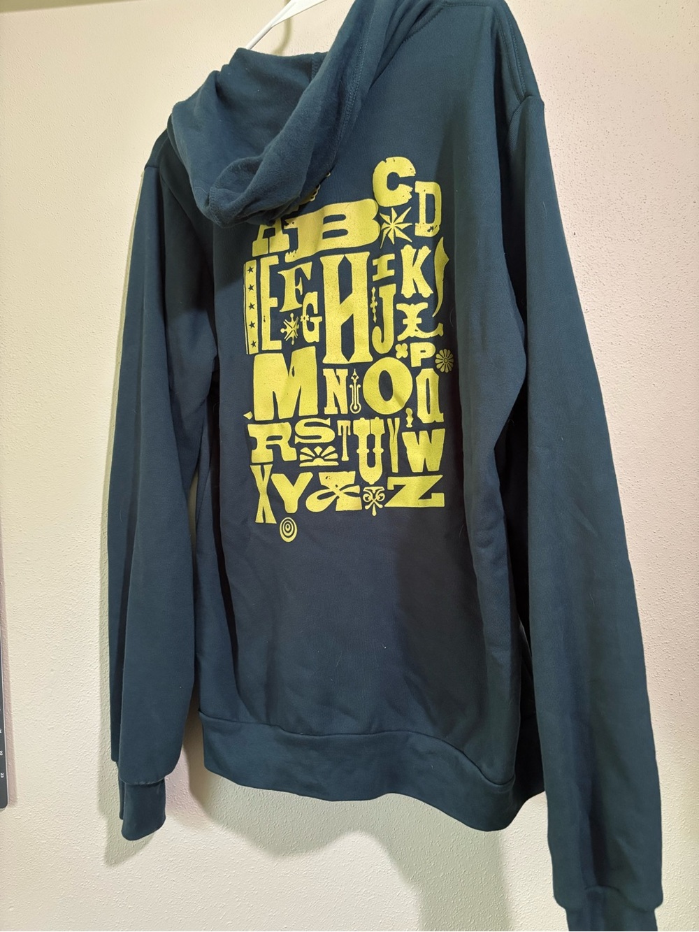 Bella Canvas Dark Teal Hoodie with Yellow Alphabet Back Graphic